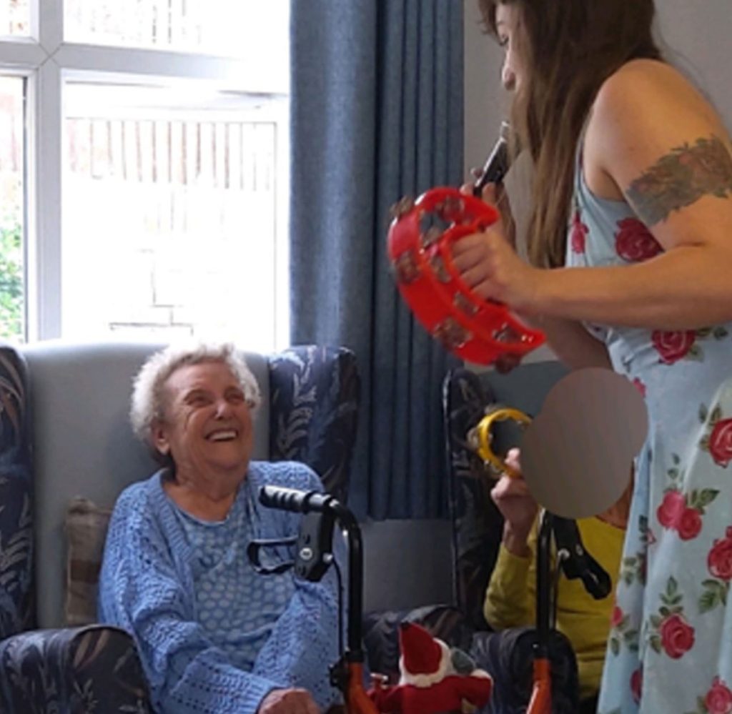 Singer Annie Jo performing live at Cross Way Care Home