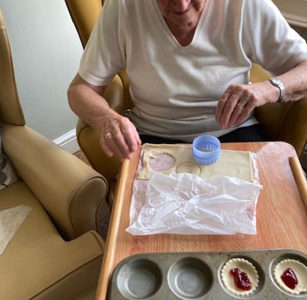 Resident baking at Beechwood House