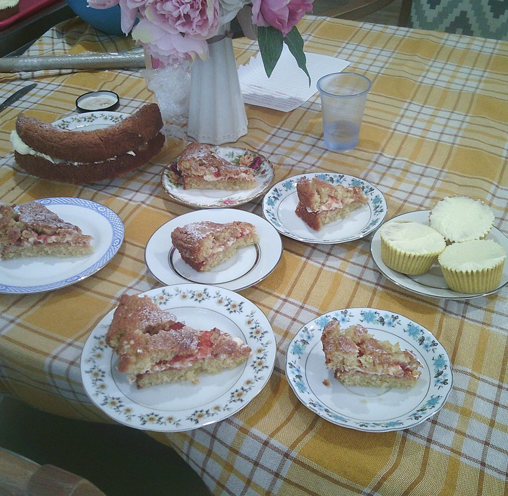 Residents enjoying a cake-baking activity together at Solent Cliffs Care Home