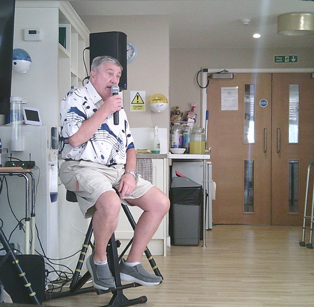 Local singer Derek entertaining residents with live music at Solent Cliffs